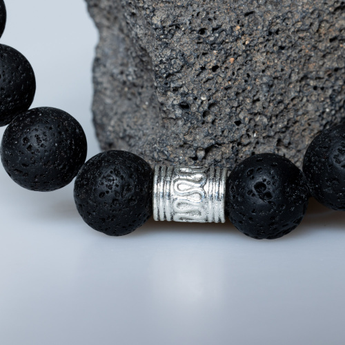 Lavastein Armband mit Gesichtern 10 mm