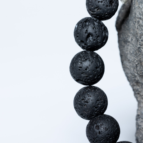 Lavastein Armband mit Gesichtern 10 mm